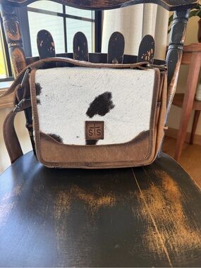 STS Ranchwear Brown Leather Crossbody with White & Black Cowhide Front